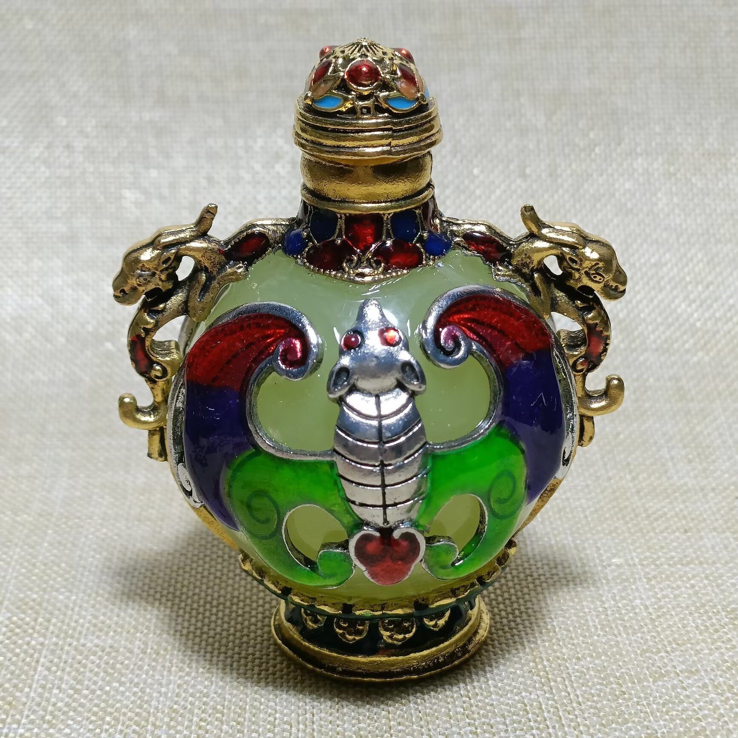 Chinese antique copper inlaid cloisonn é luminous snuff bottle