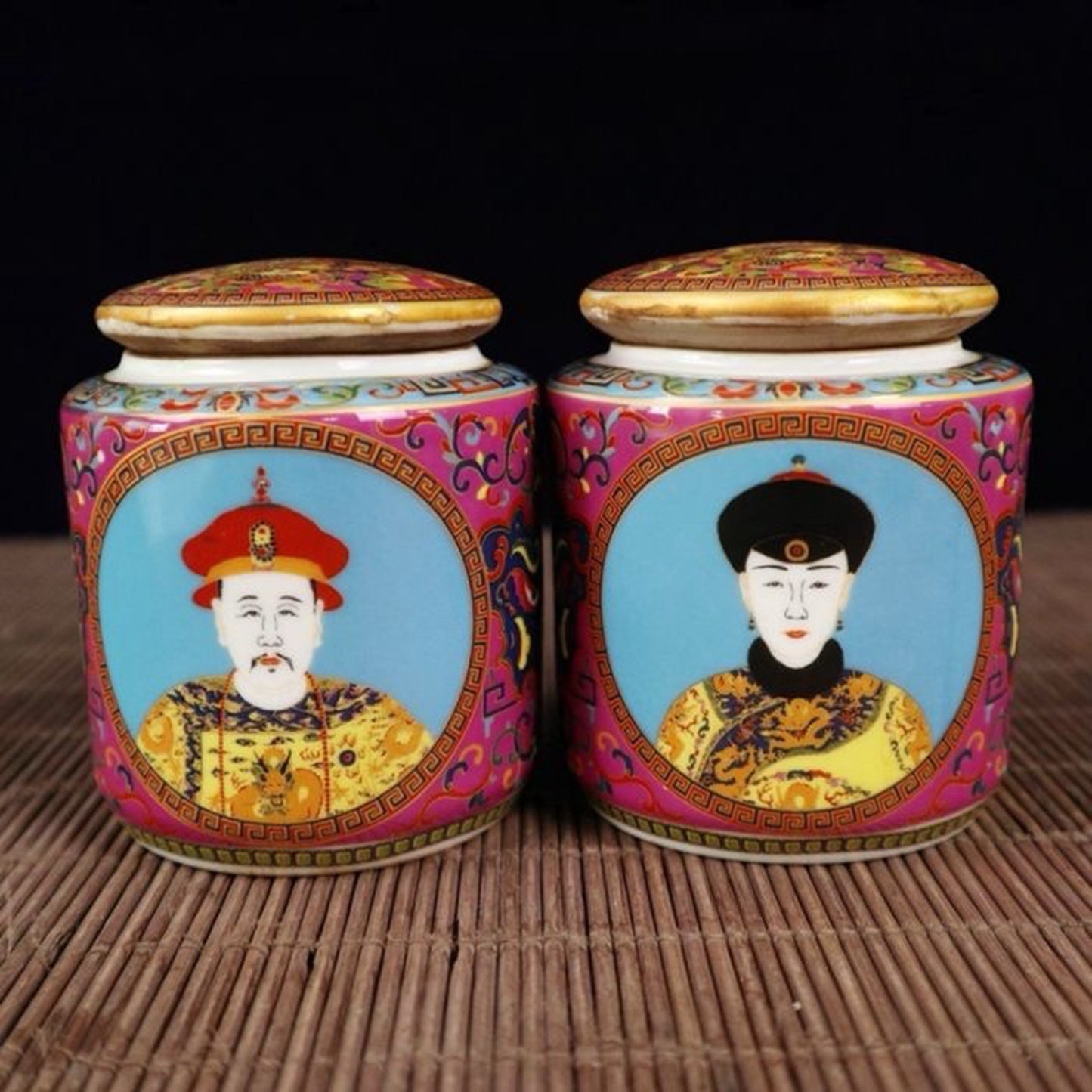 A pair of enamel colored figure patterned lid jars