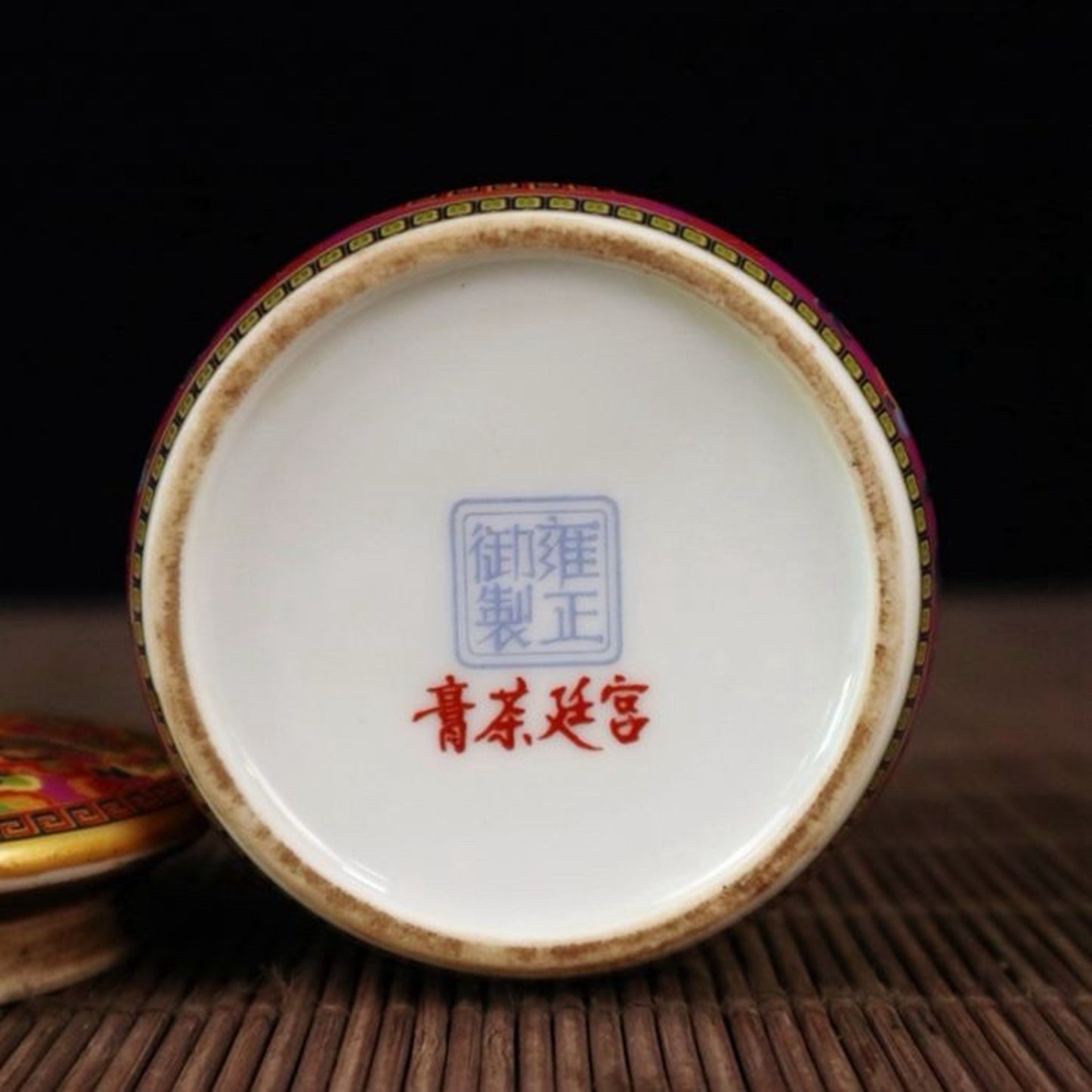 A pair of enamel colored figure patterned lid jars