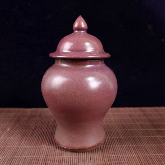 Kiln turned red glazed general jar
