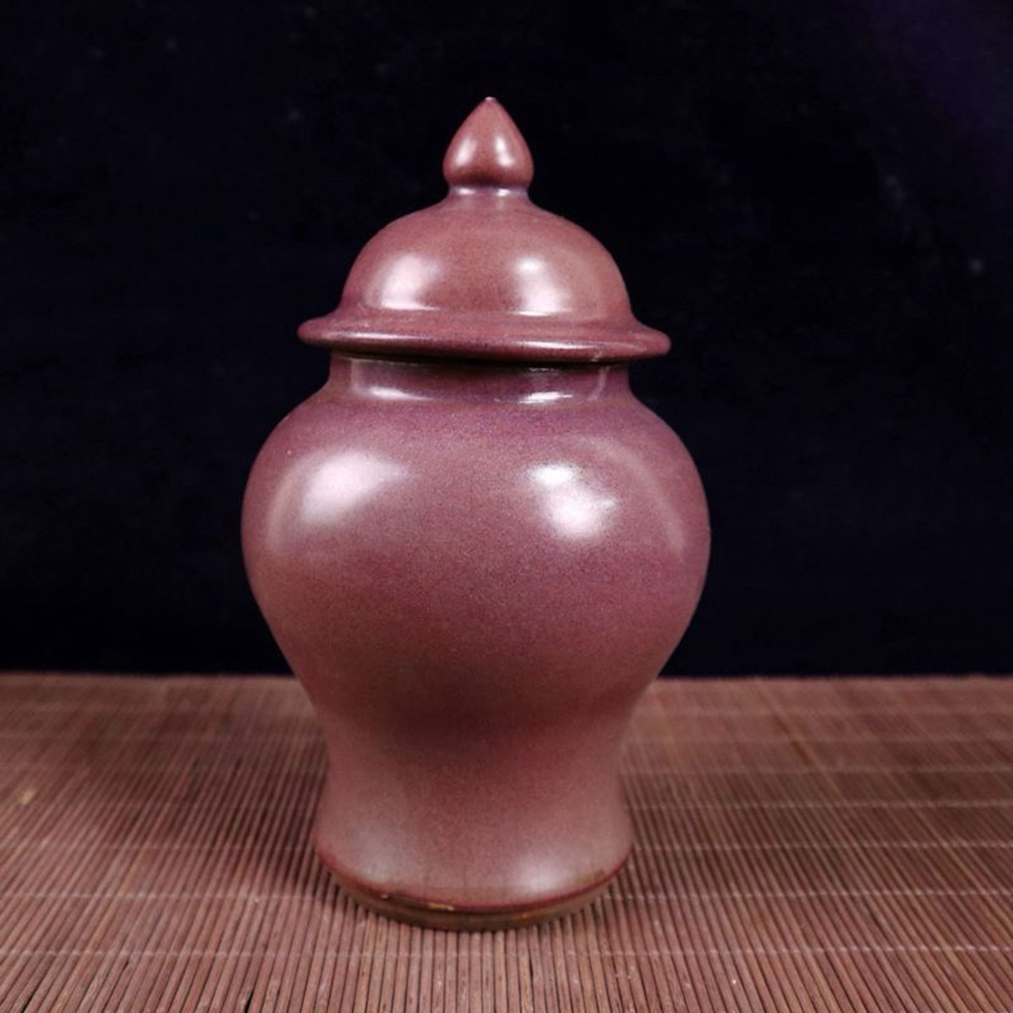 Kiln turned red glazed general jar