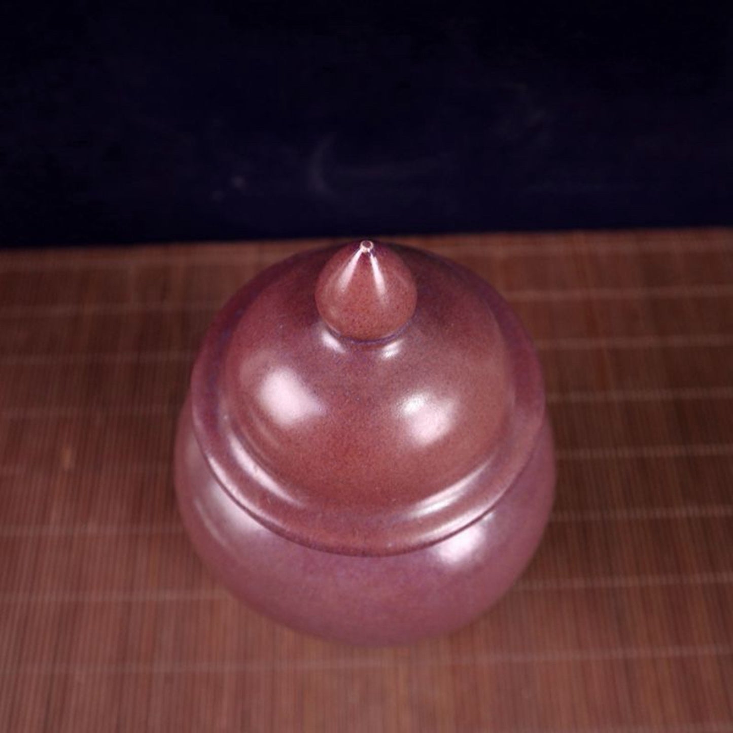Kiln turned red glazed general jar