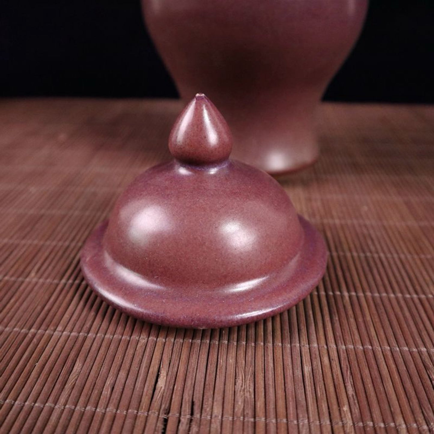 Kiln turned red glazed general jar