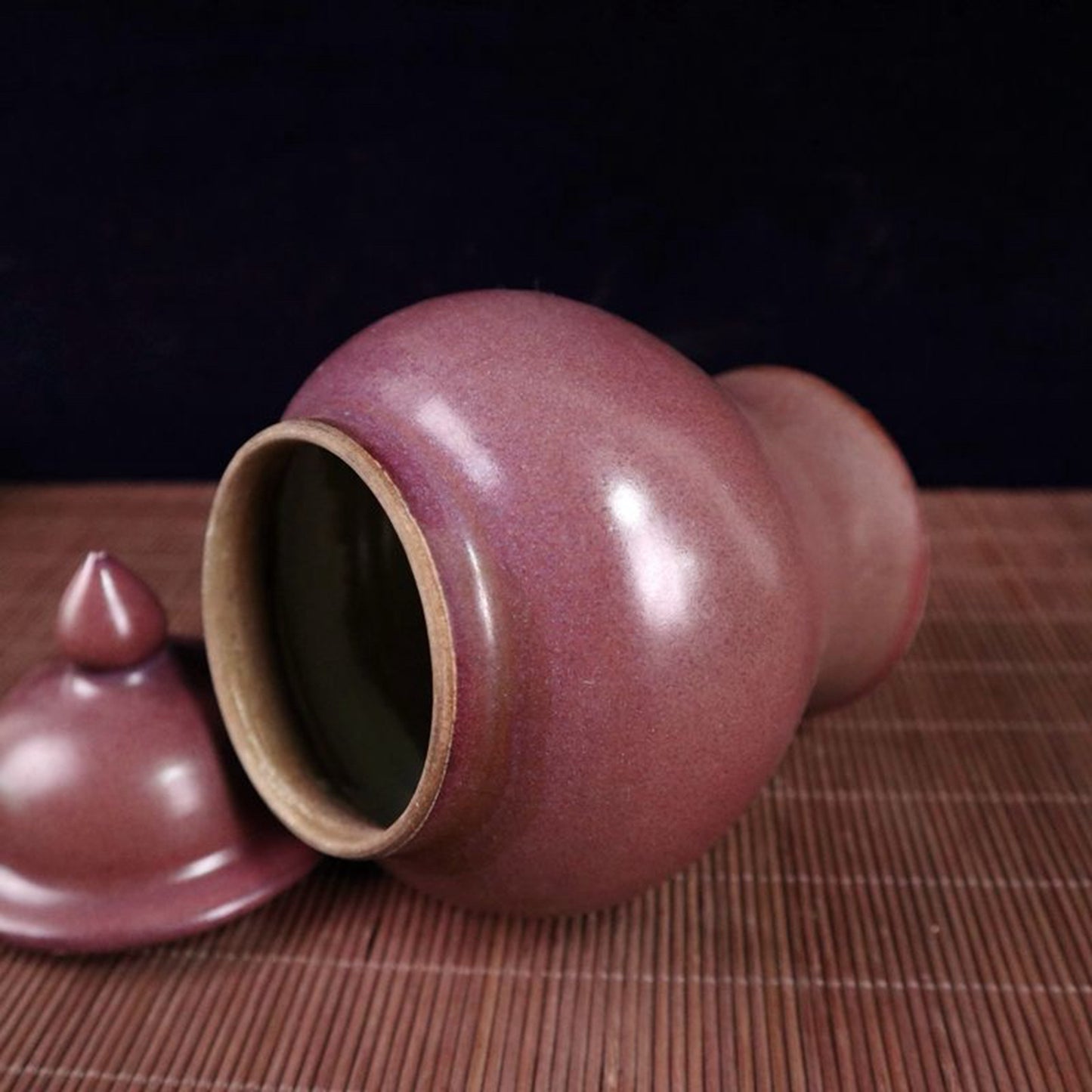 Kiln turned red glazed general jar