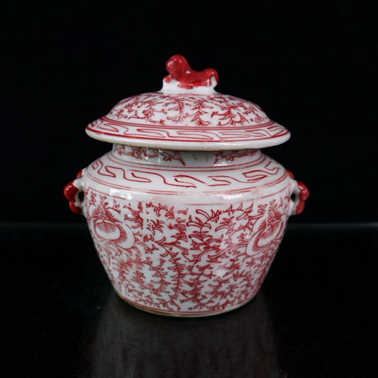 Glazed red entangled branch lotus patterned covered jar