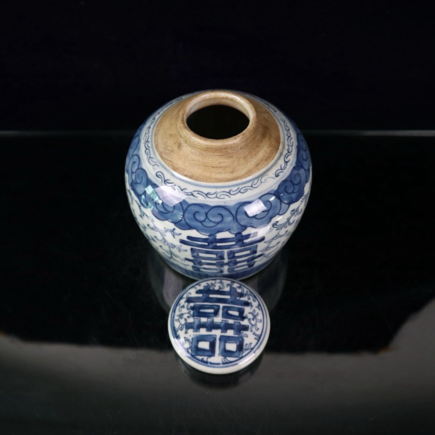 Ceramic blue and white double happiness entangled branch lotus patterned lid jar