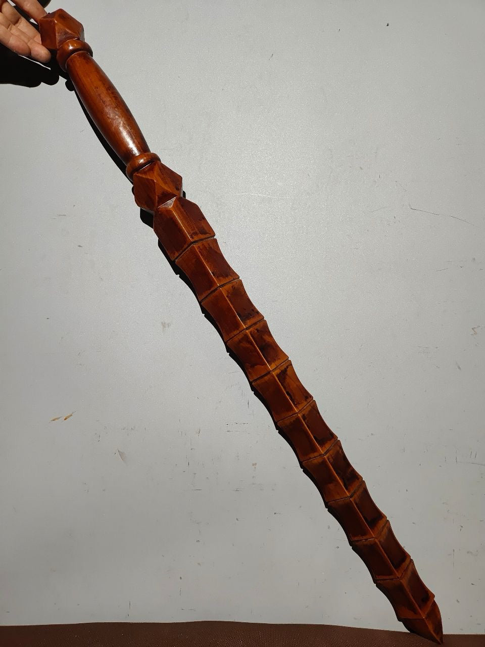 A bamboo whip carved from old peach wood