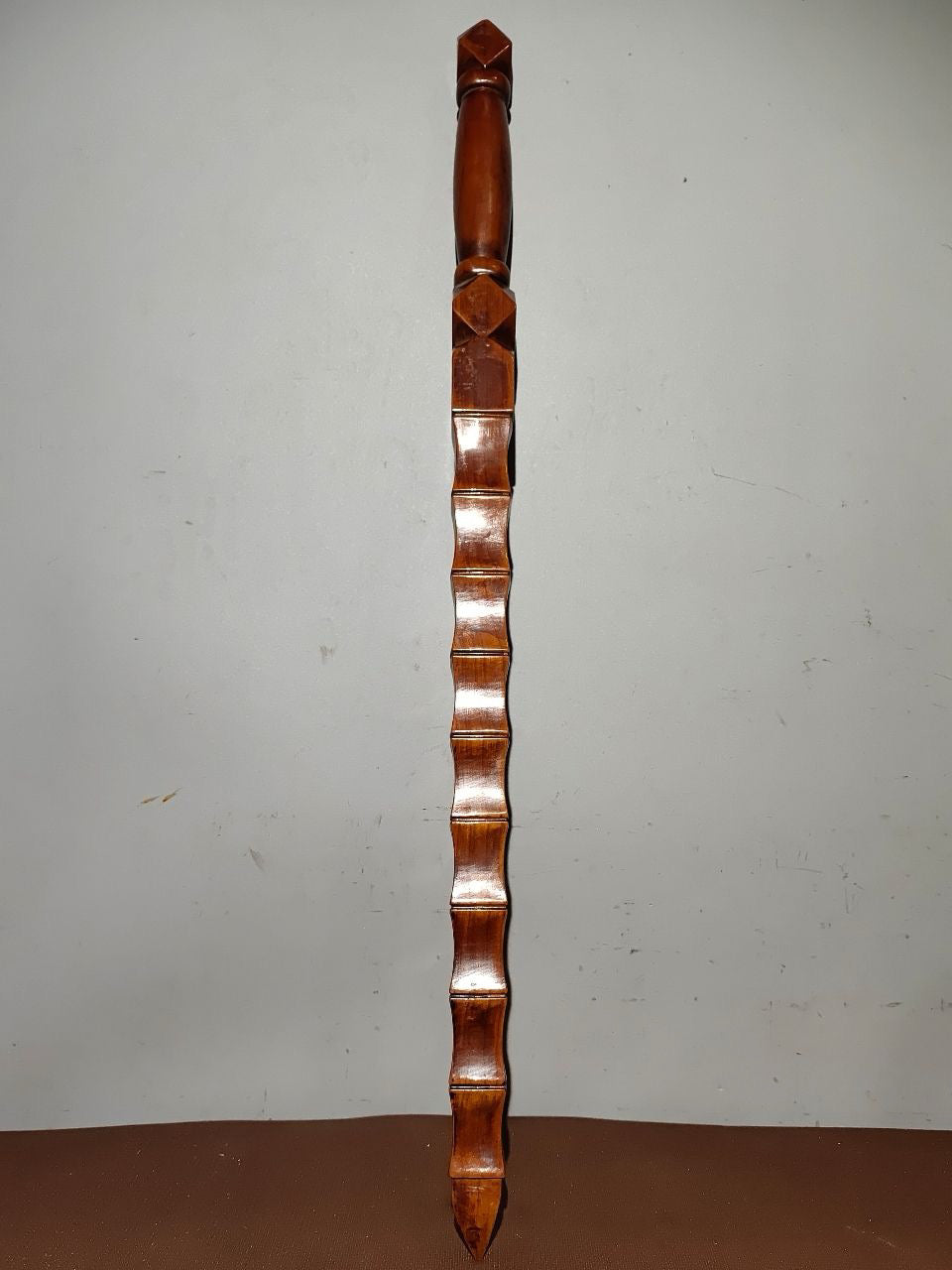 A bamboo whip carved from old peach wood