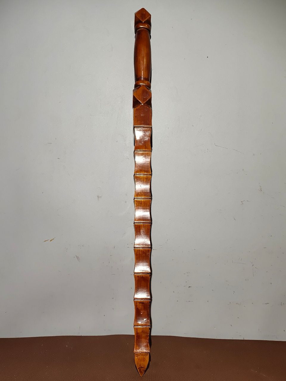 A bamboo whip carved from old peach wood