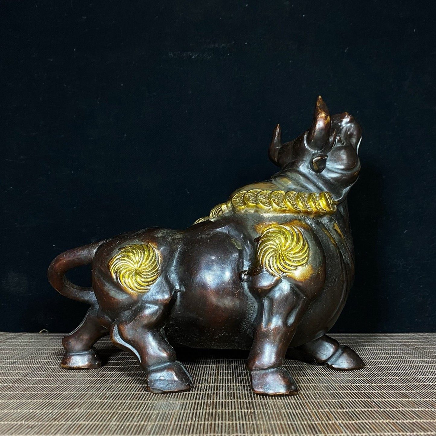 Pure copper gilded bull aura soaring to the sky