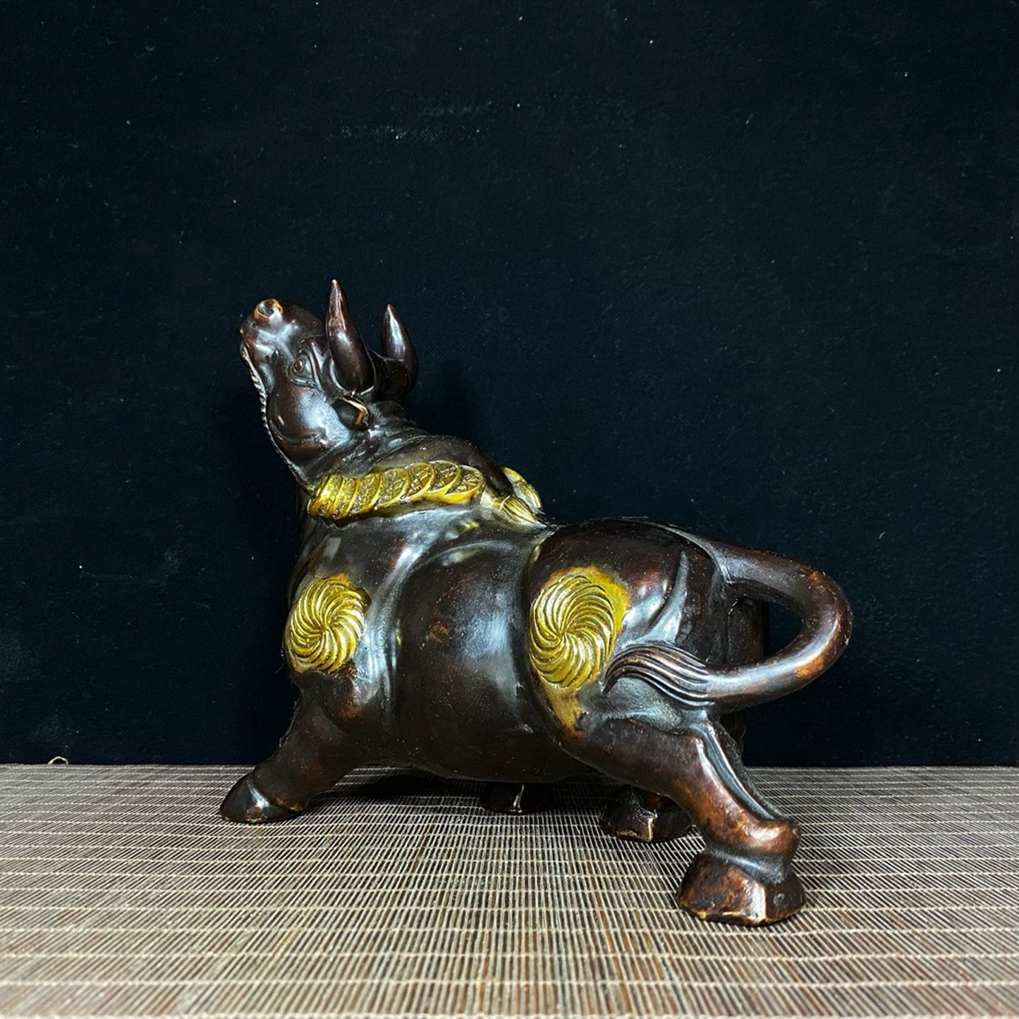 Pure copper gilded bull aura soaring to the sky