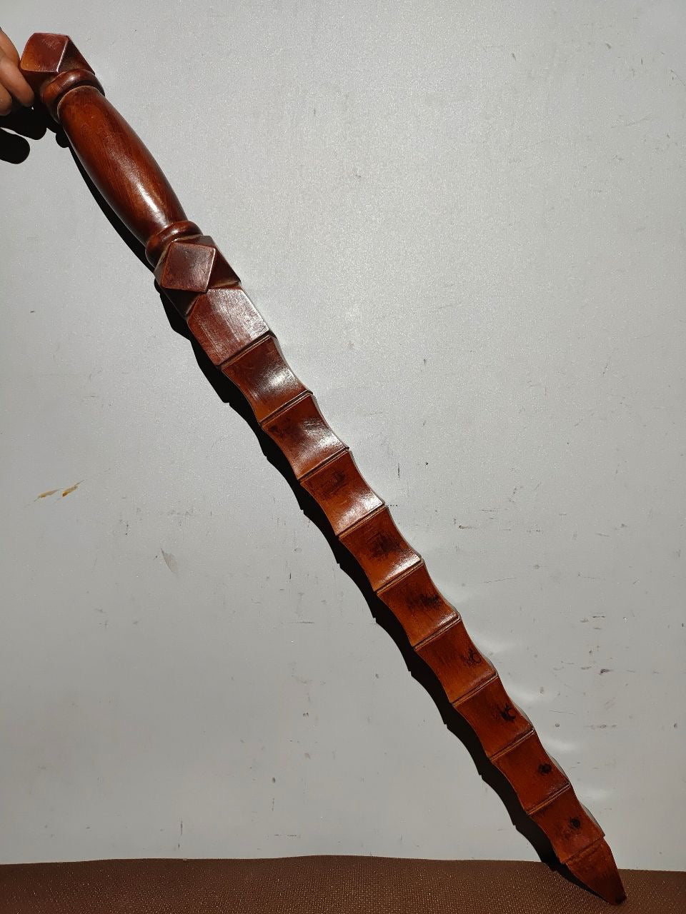 A bamboo whip carved from old peach wood