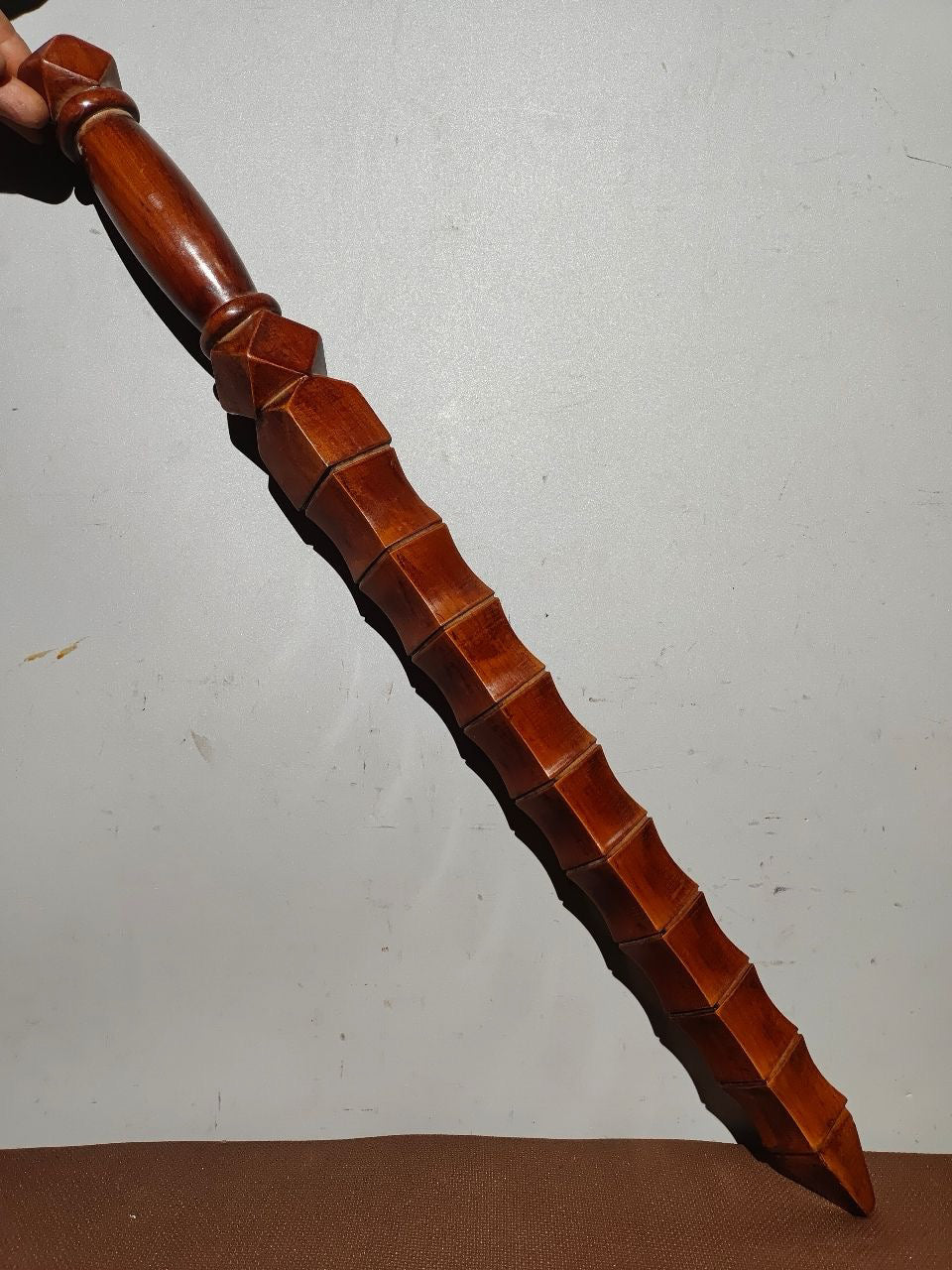 A bamboo whip carved from old peach wood