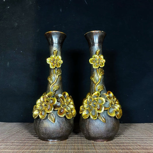 A pair of pure copper gilded high relief peony vases