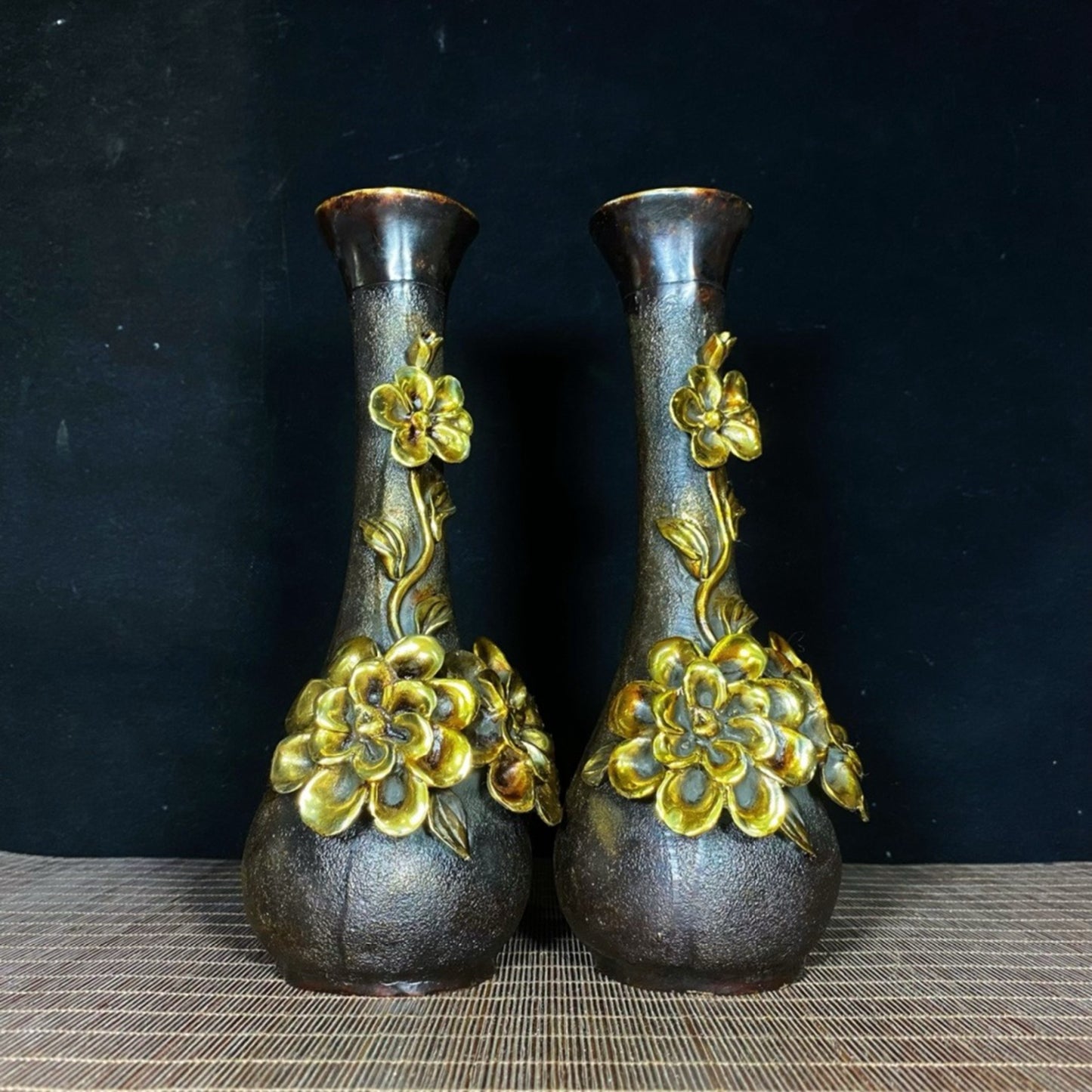 A pair of pure copper gilded high relief peony vases