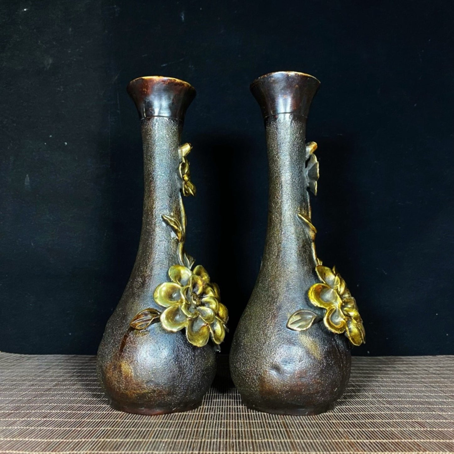 A pair of pure copper gilded high relief peony vases