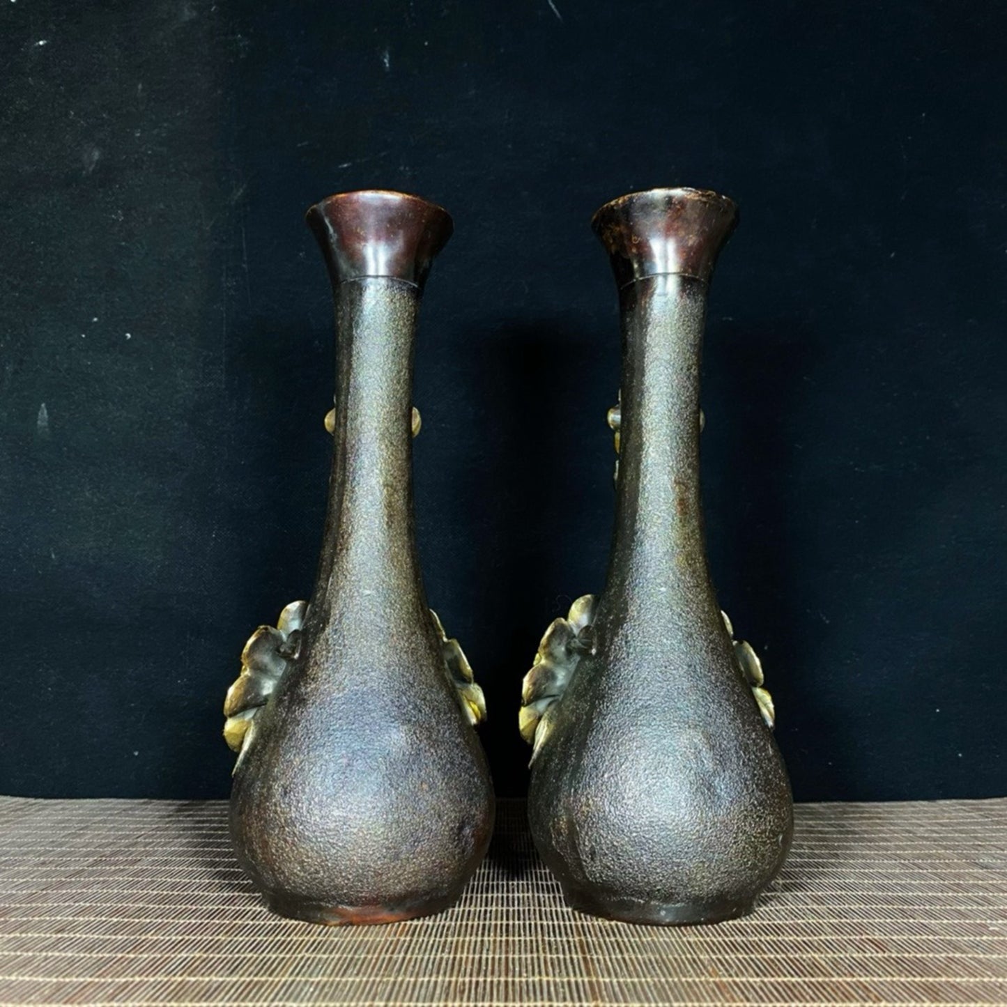 A pair of pure copper gilded high relief peony vases