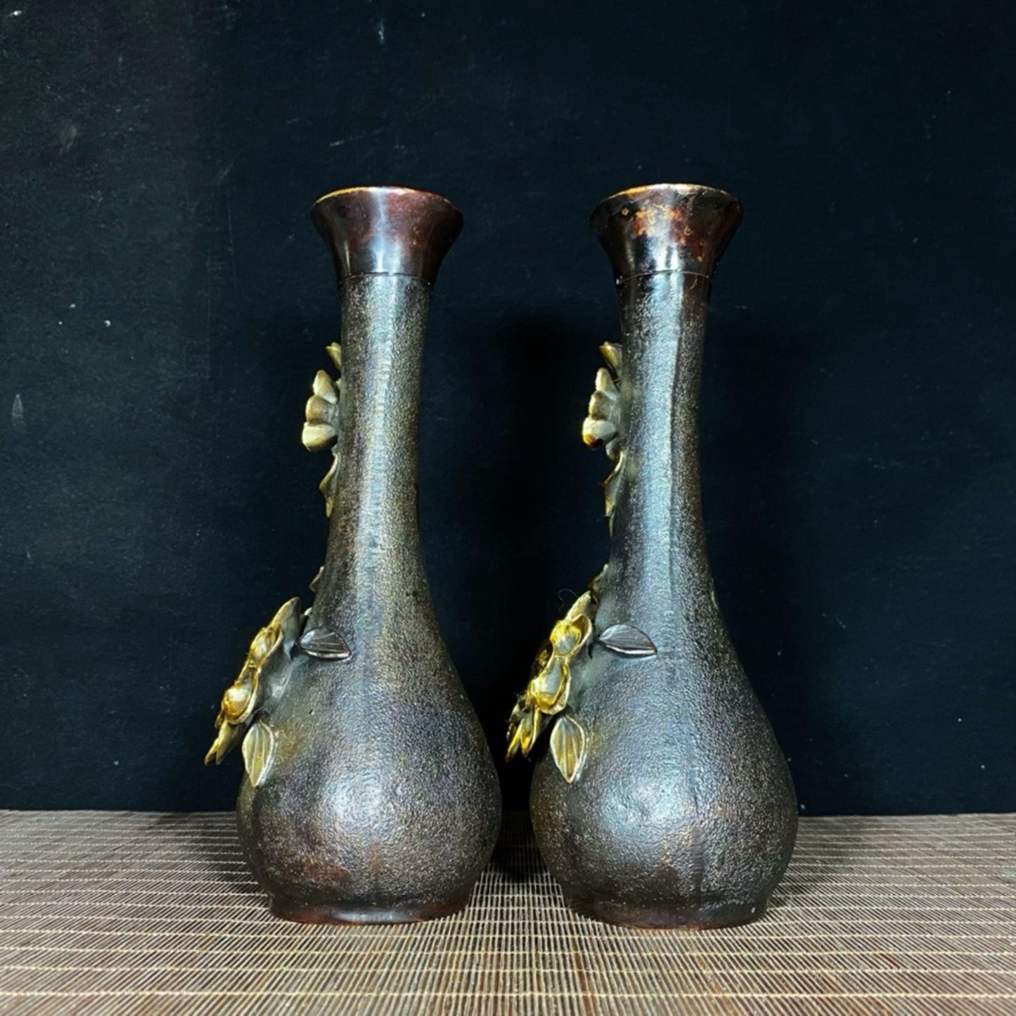 A pair of pure copper gilded high relief peony vases