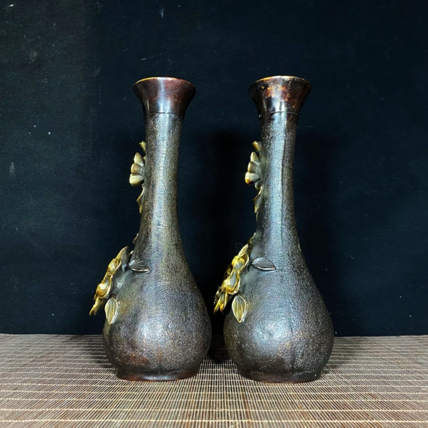 A pair of pure copper gilded high relief peony vases