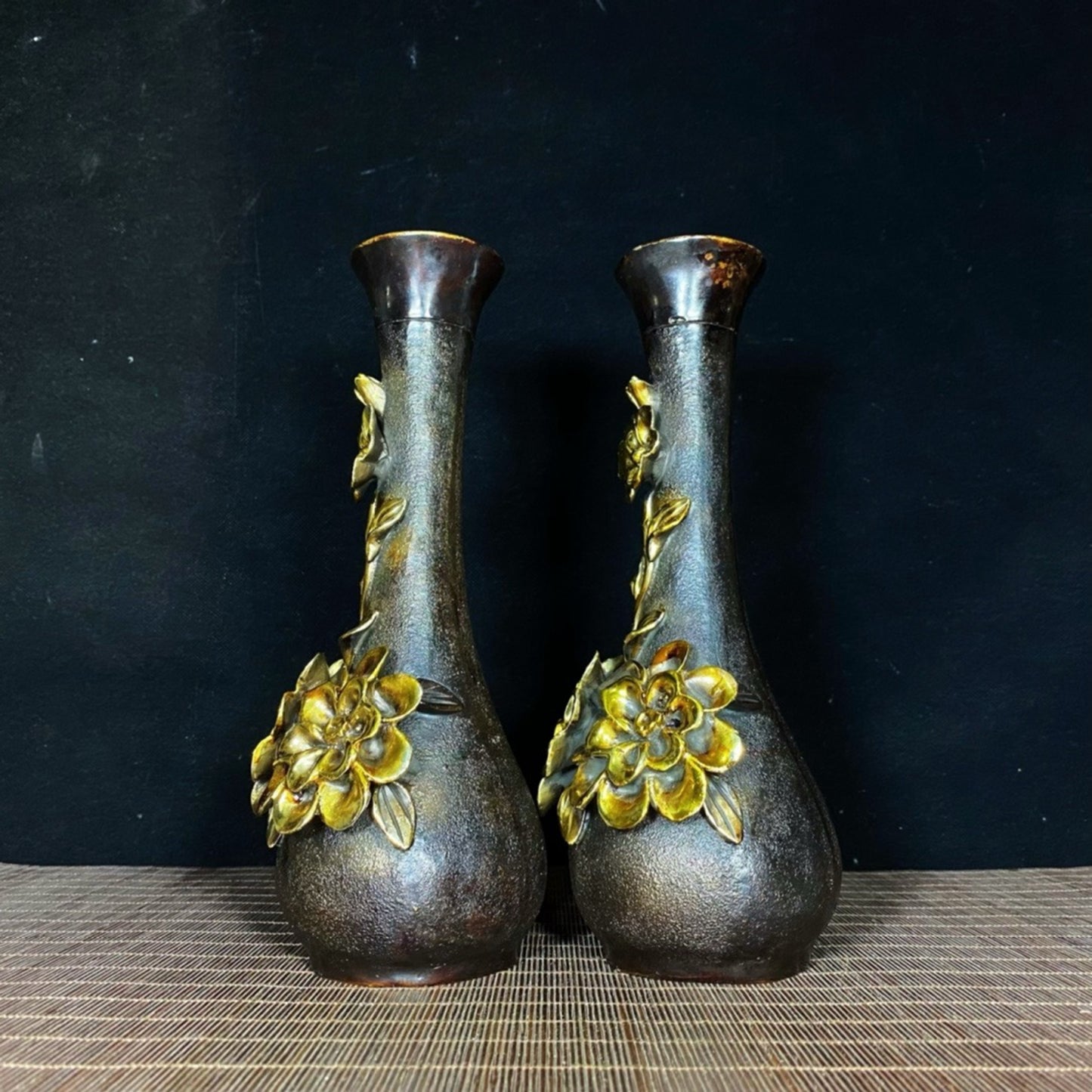 A pair of pure copper gilded high relief peony vases