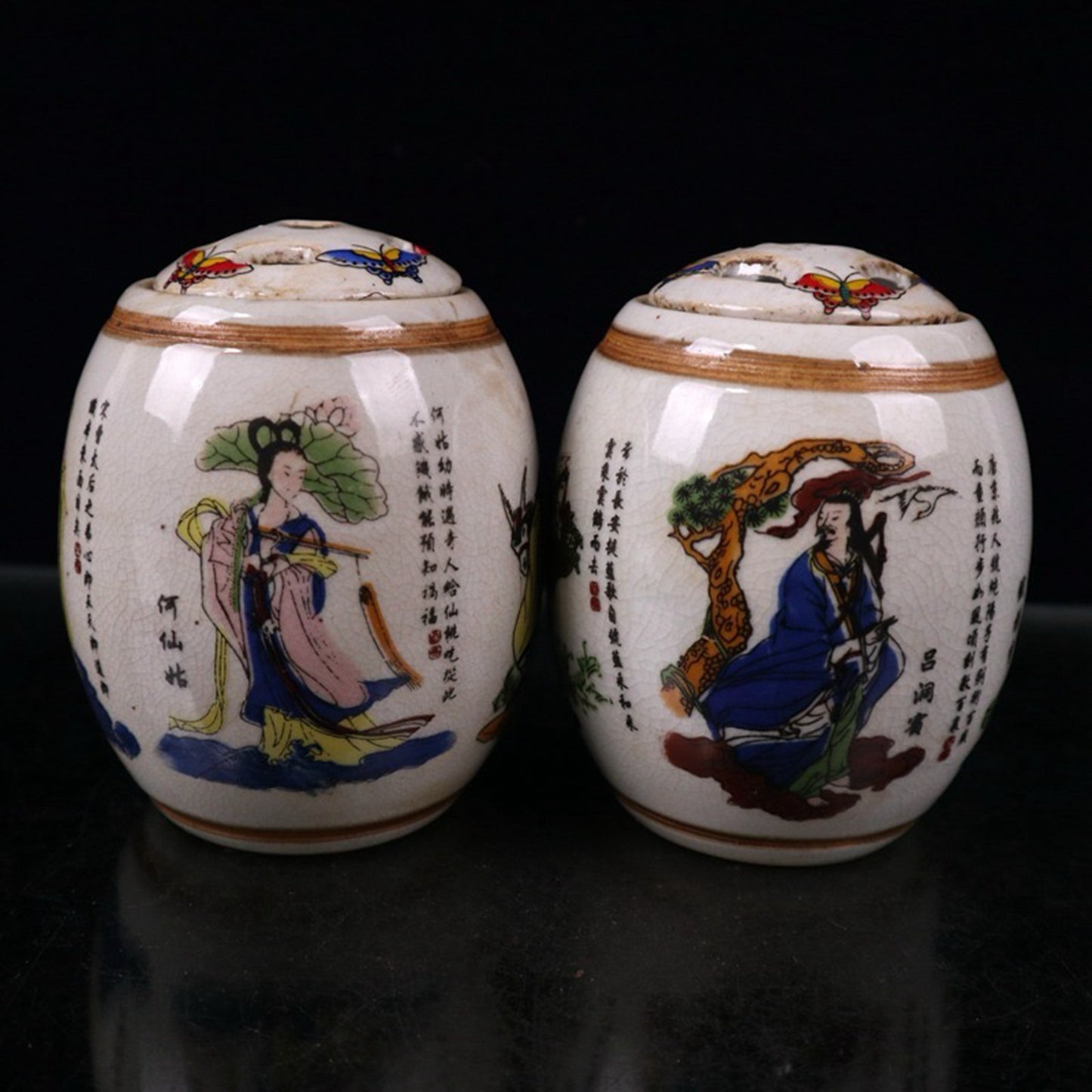 A pair of ceramic open panel pink Eight Immortals patterned waist drum lid jars