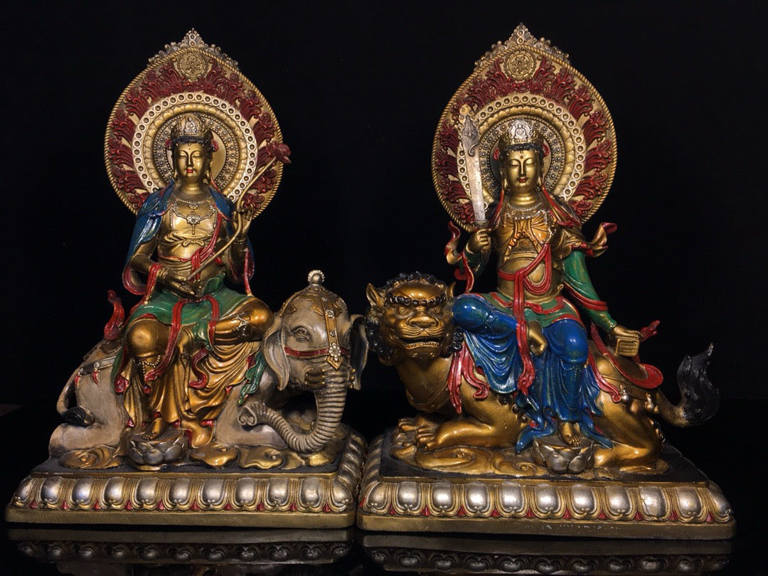 A pair of Chinese antique painted Manjushri Bodhisattva statues