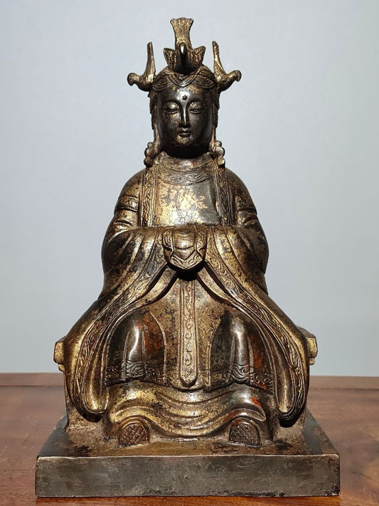 A statue of Mazu, a Buddha statue made of old copper, mud, gold, blooming, and sprinkled with cinnabar