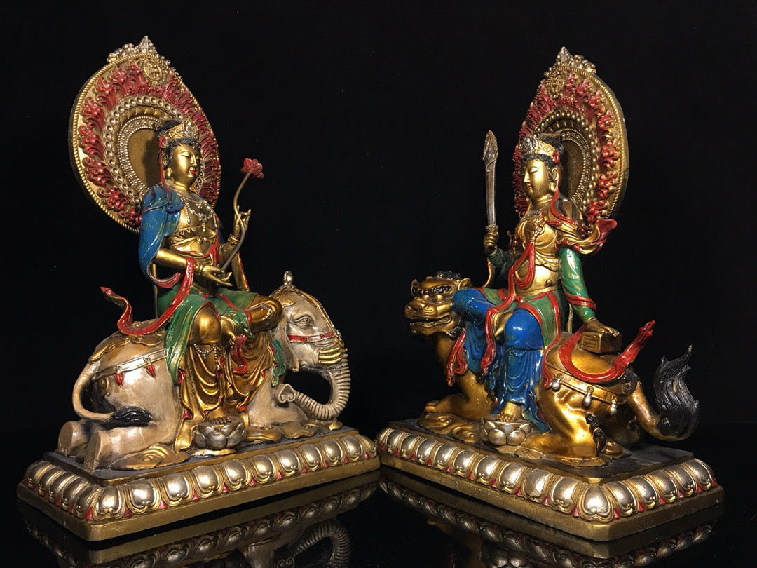 A pair of Chinese antique painted Manjushri Bodhisattva statues