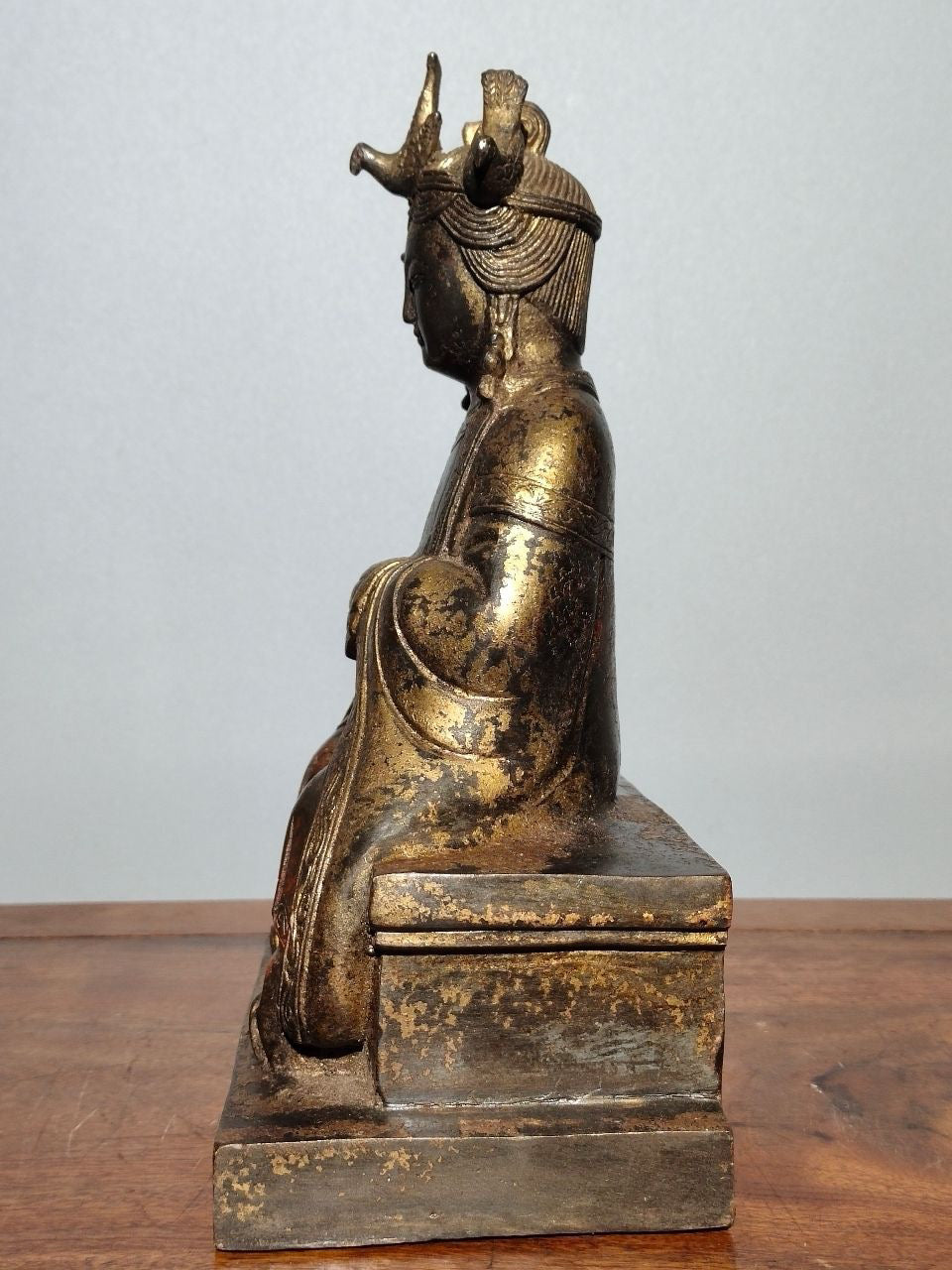 A statue of Mazu, a Buddha statue made of old copper, mud, gold, blooming, and sprinkled with cinnabar