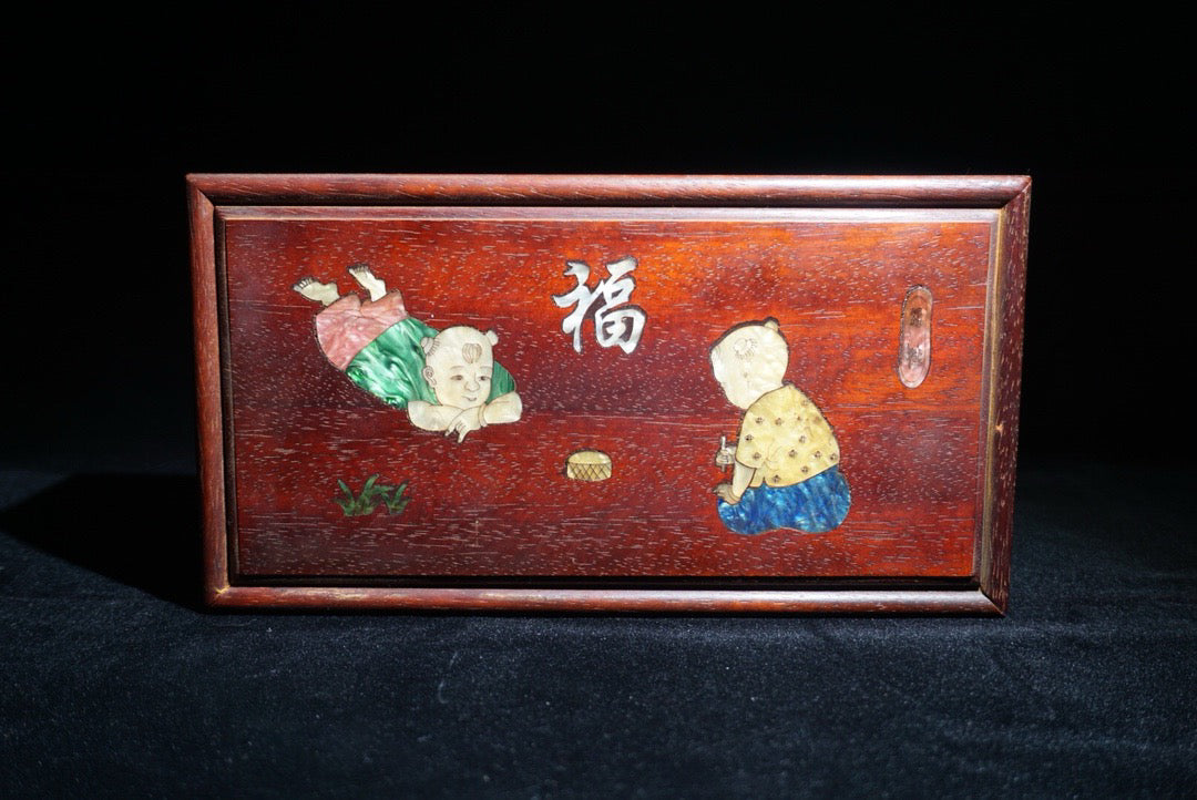 Pear wood inlaid shell shaped lucky push-pull box in front of me