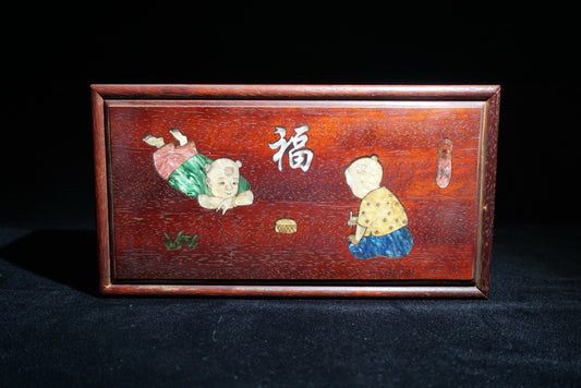 Pear wood inlaid shell shaped lucky push-pull box in front of me