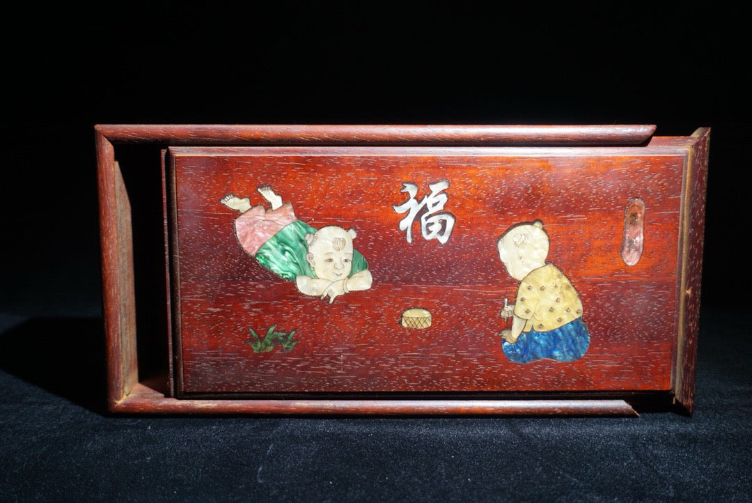 Pear wood inlaid shell shaped lucky push-pull box in front of me