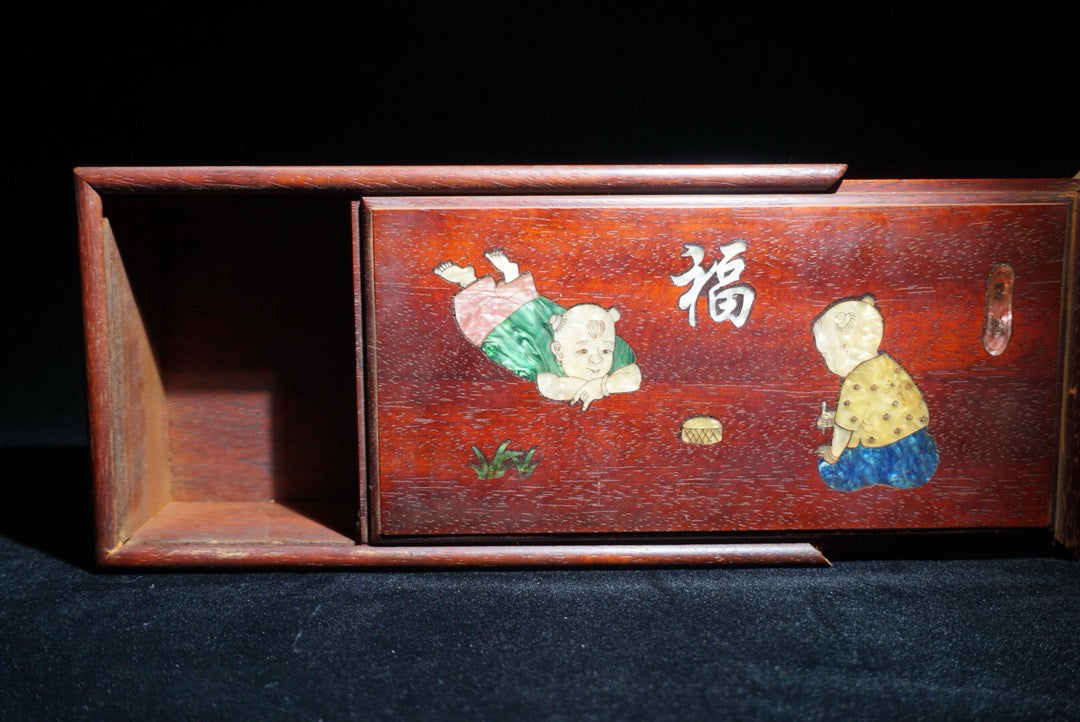 Pear wood inlaid shell shaped lucky push-pull box in front of me