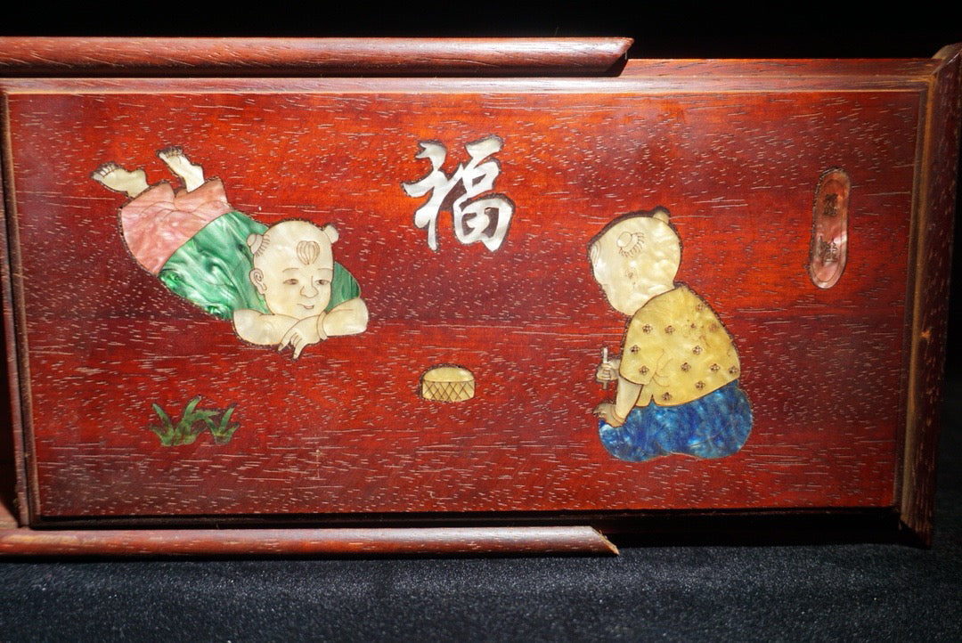 Pear wood inlaid shell shaped lucky push-pull box in front of me