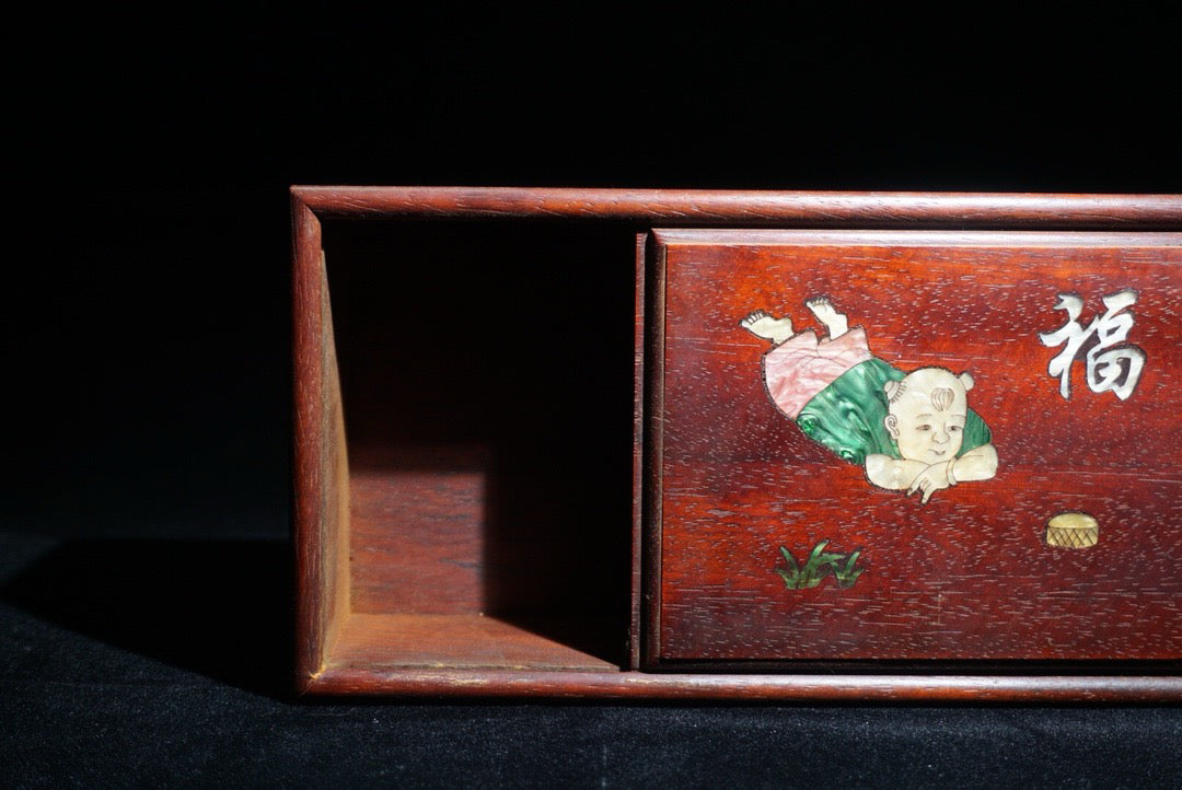 Pear wood inlaid shell shaped lucky push-pull box in front of me