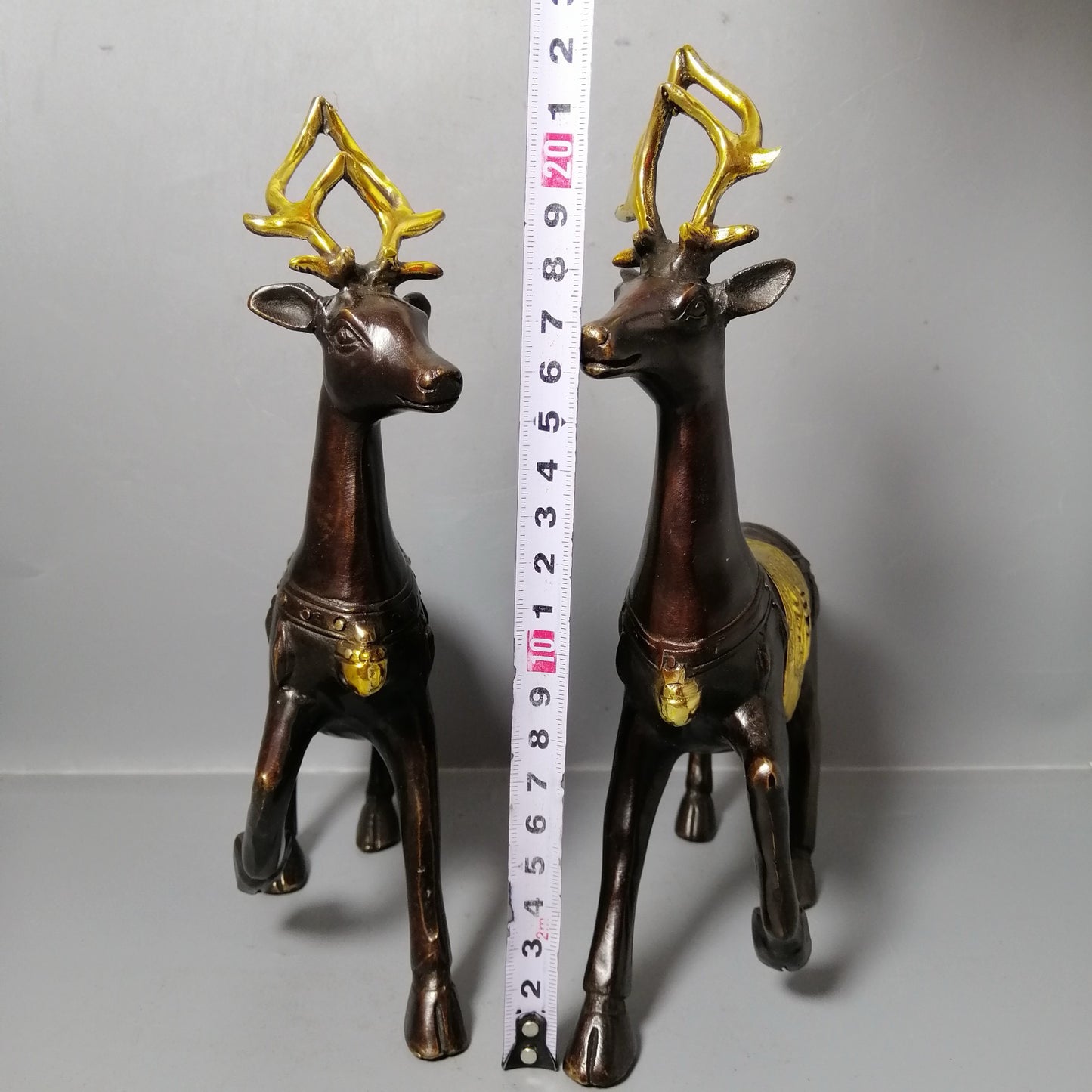 A pair of Chinese antique pure copper deer ornaments