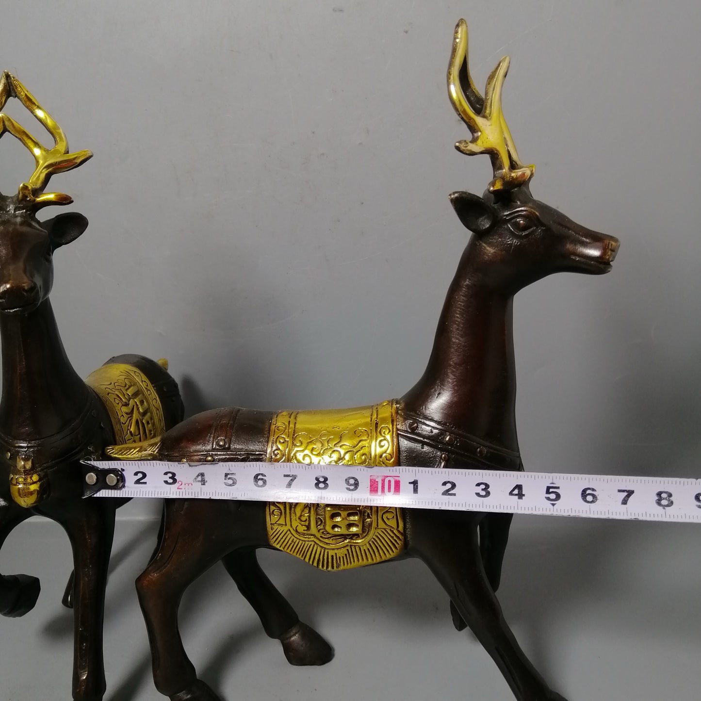 A pair of Chinese antique pure copper deer ornaments