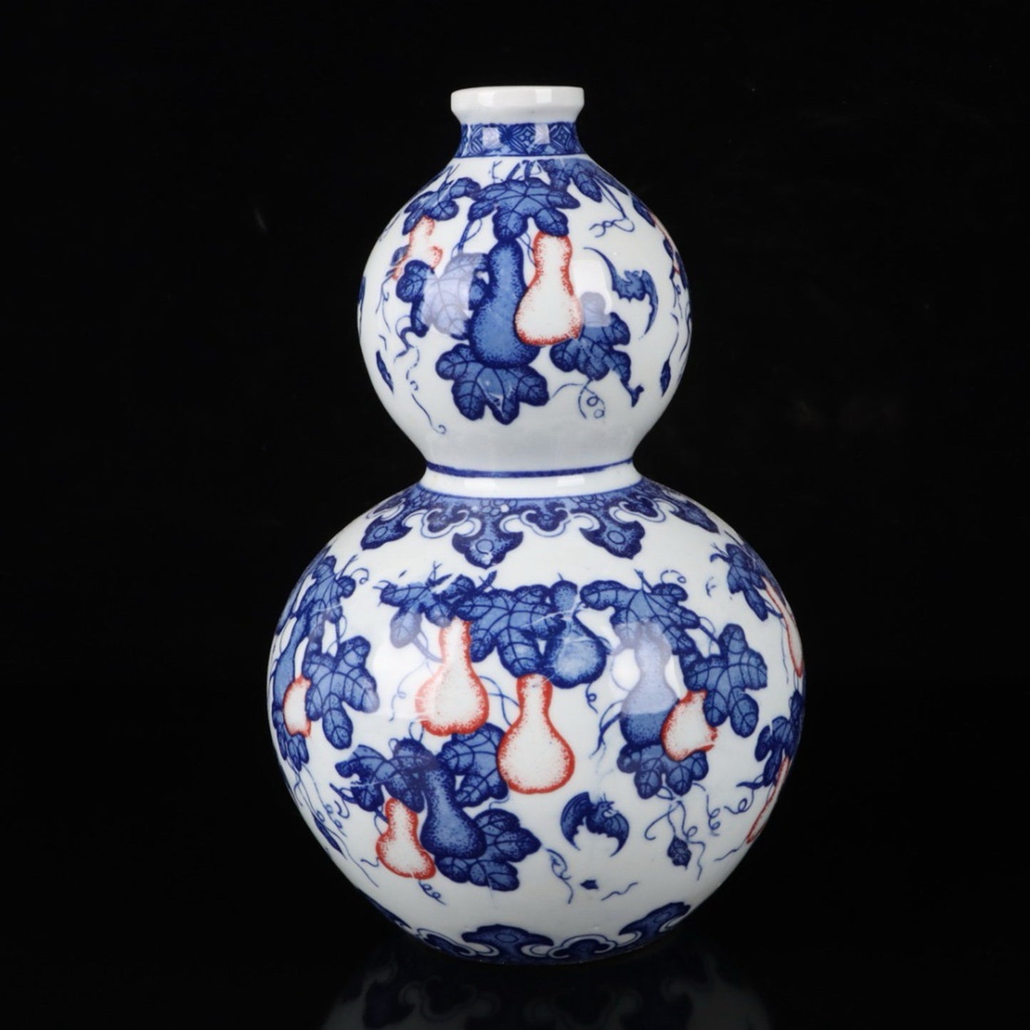 Ceramic blue and white glazed gourd vase