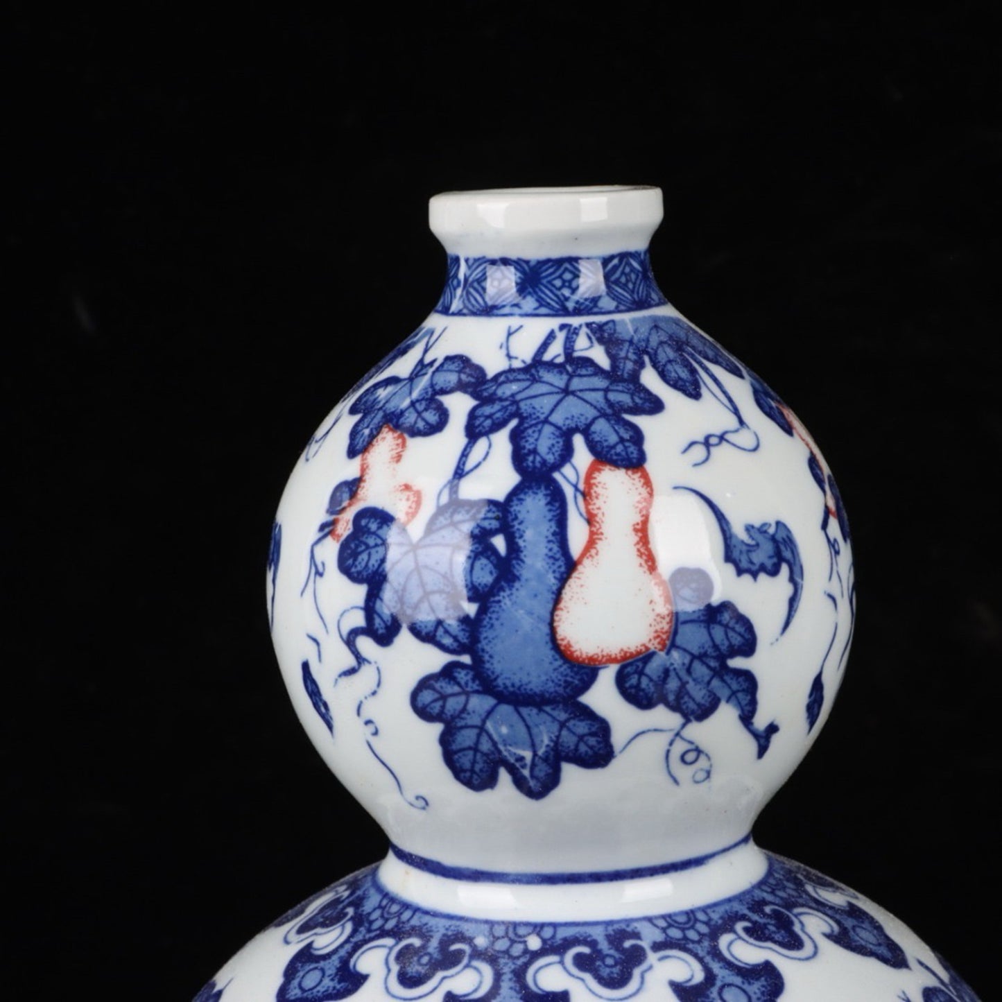 Ceramic blue and white glazed gourd vase