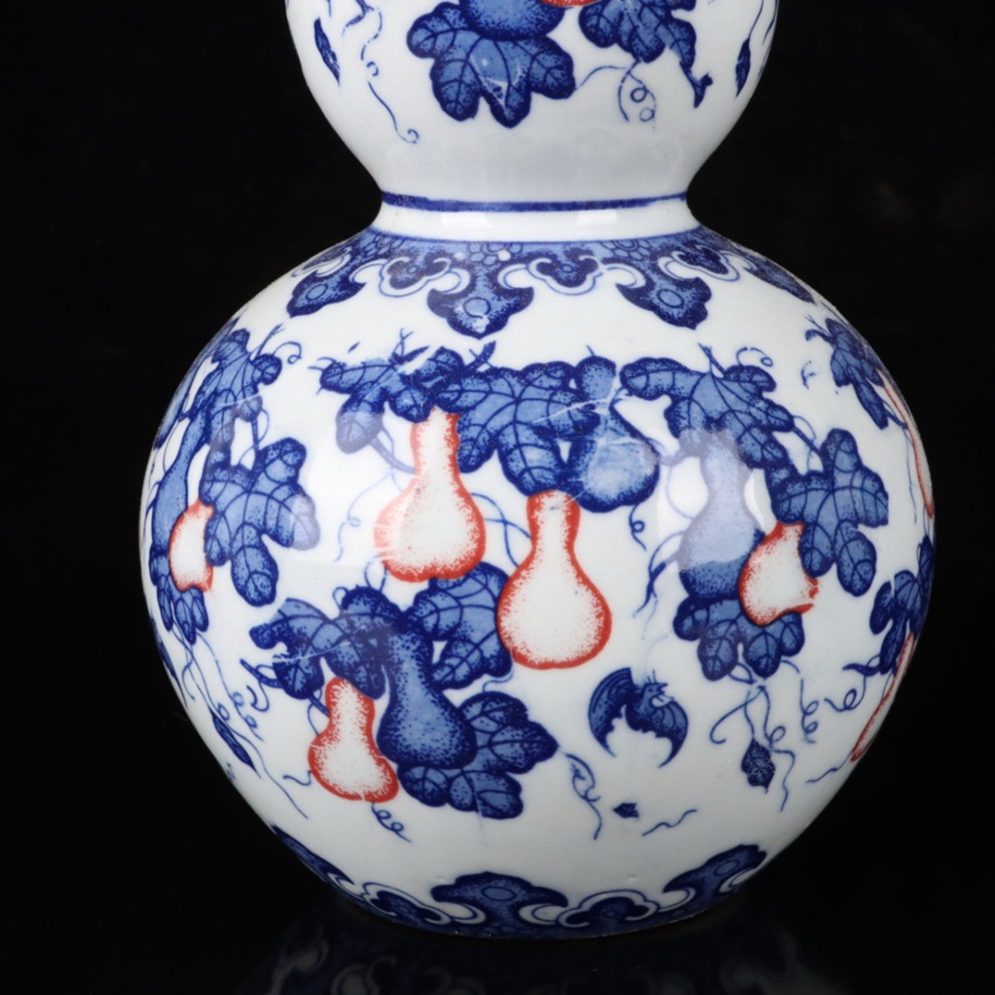 Ceramic blue and white glazed gourd vase