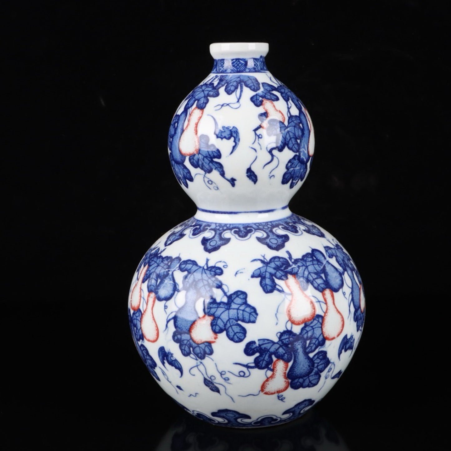 Ceramic blue and white glazed gourd vase