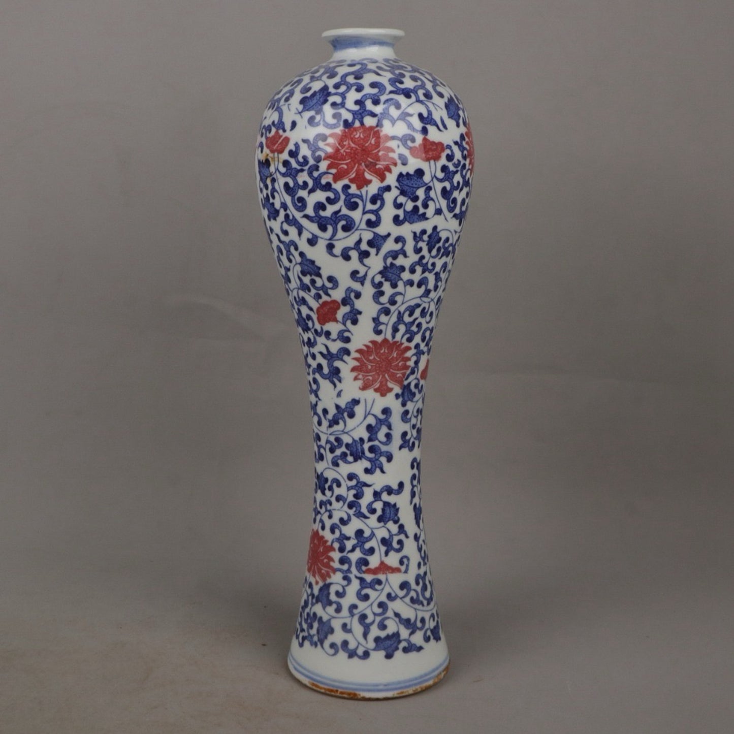 A pair of ceramic blue and white glazed plum blossom vases