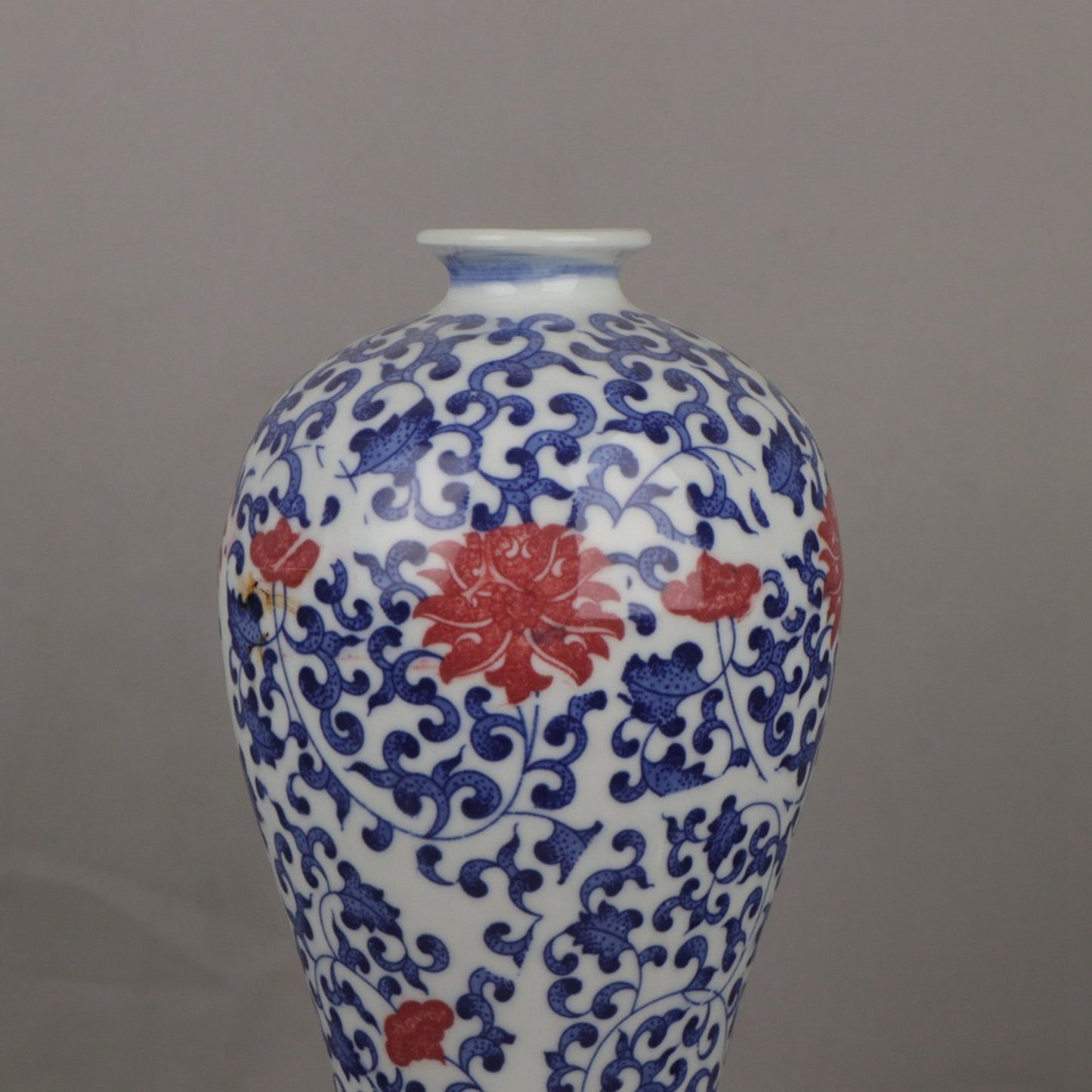 A pair of ceramic blue and white glazed plum blossom vases