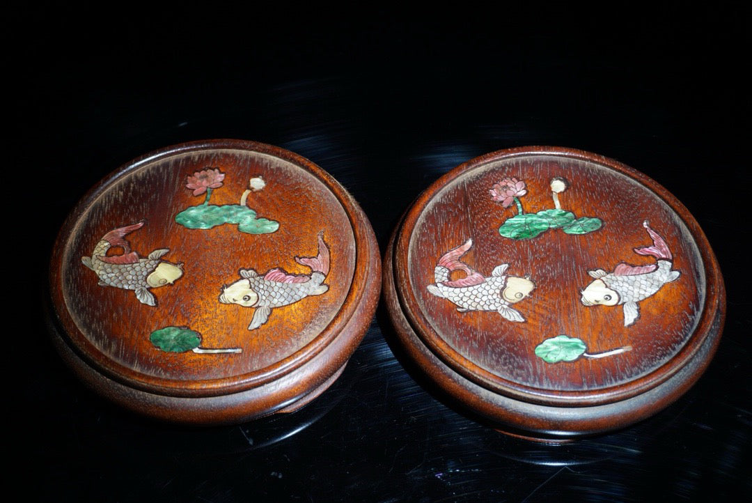 A pair of rosewood inlaid shells with a surplus base for years