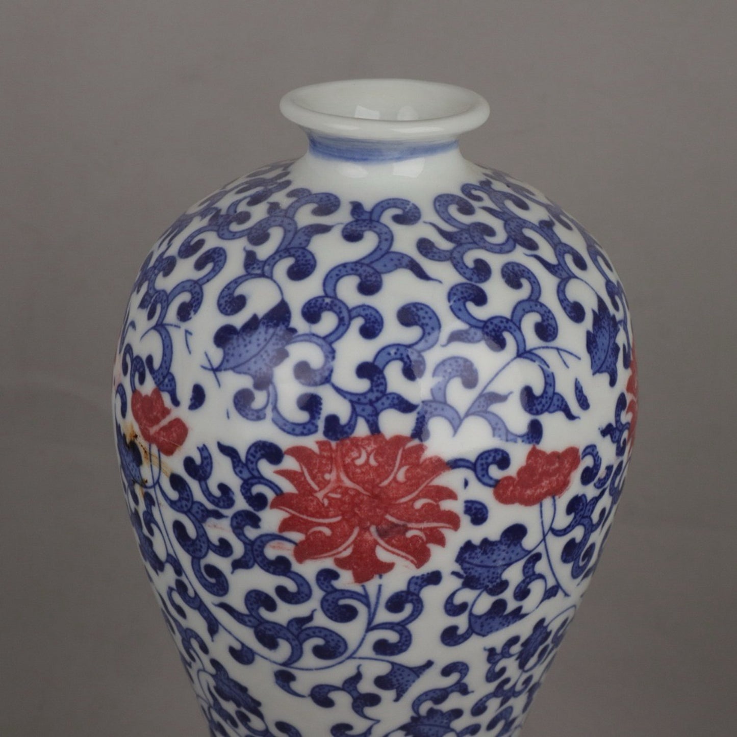 A pair of ceramic blue and white glazed plum blossom vases