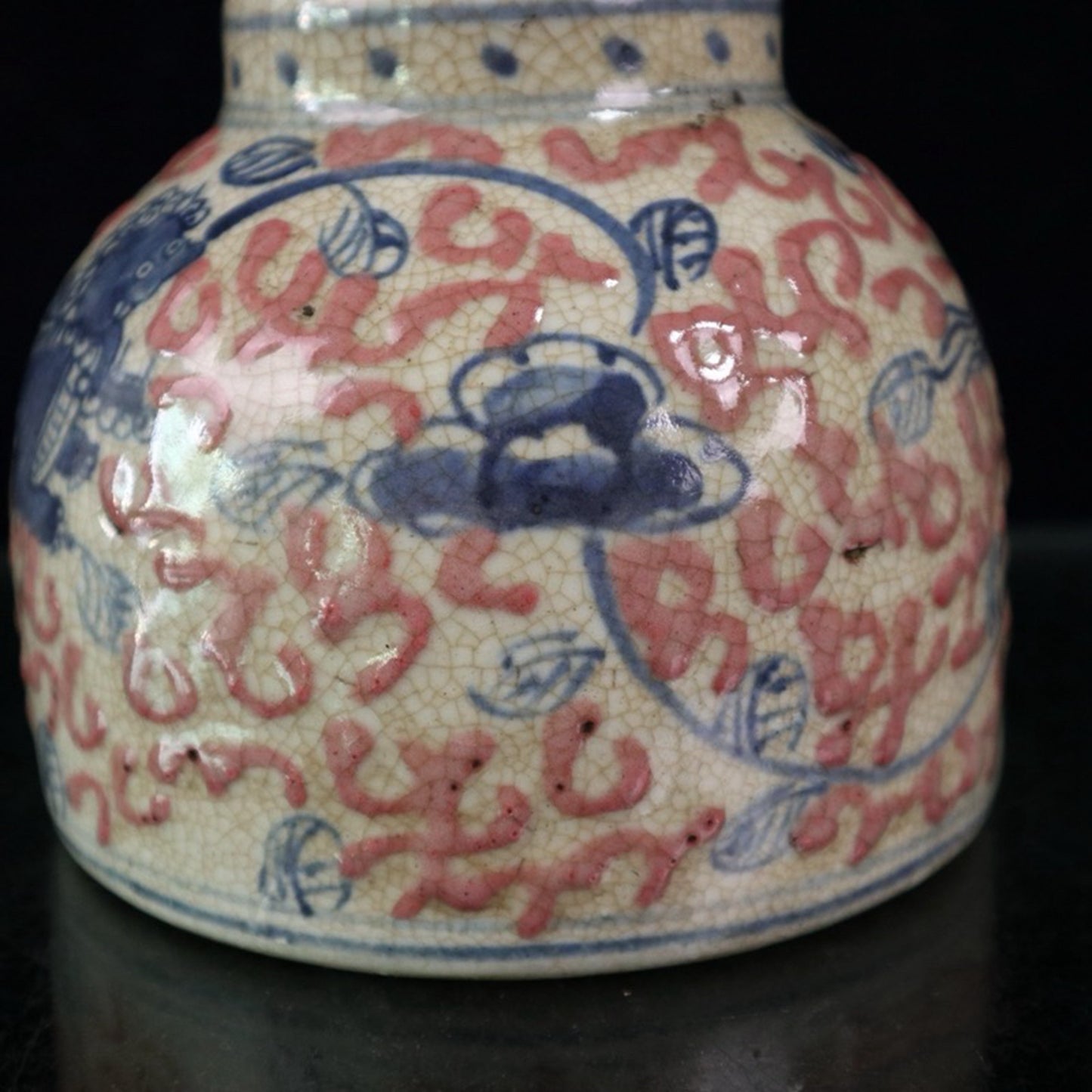 Ceramic blue and white glazed red lion patterned jar