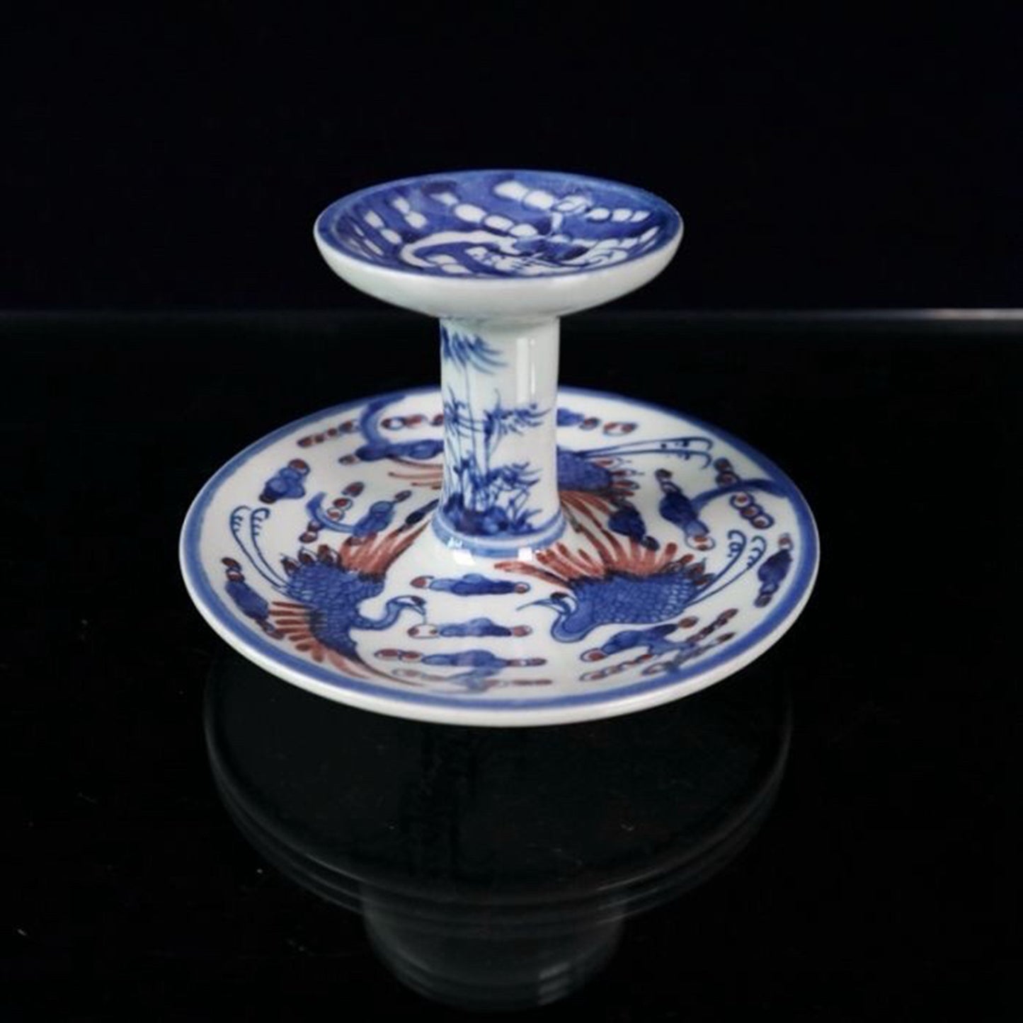 Ceramic blue and white glazed candlestick