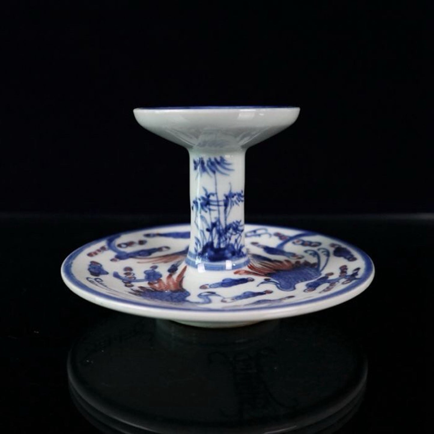 Ceramic blue and white glazed candlestick