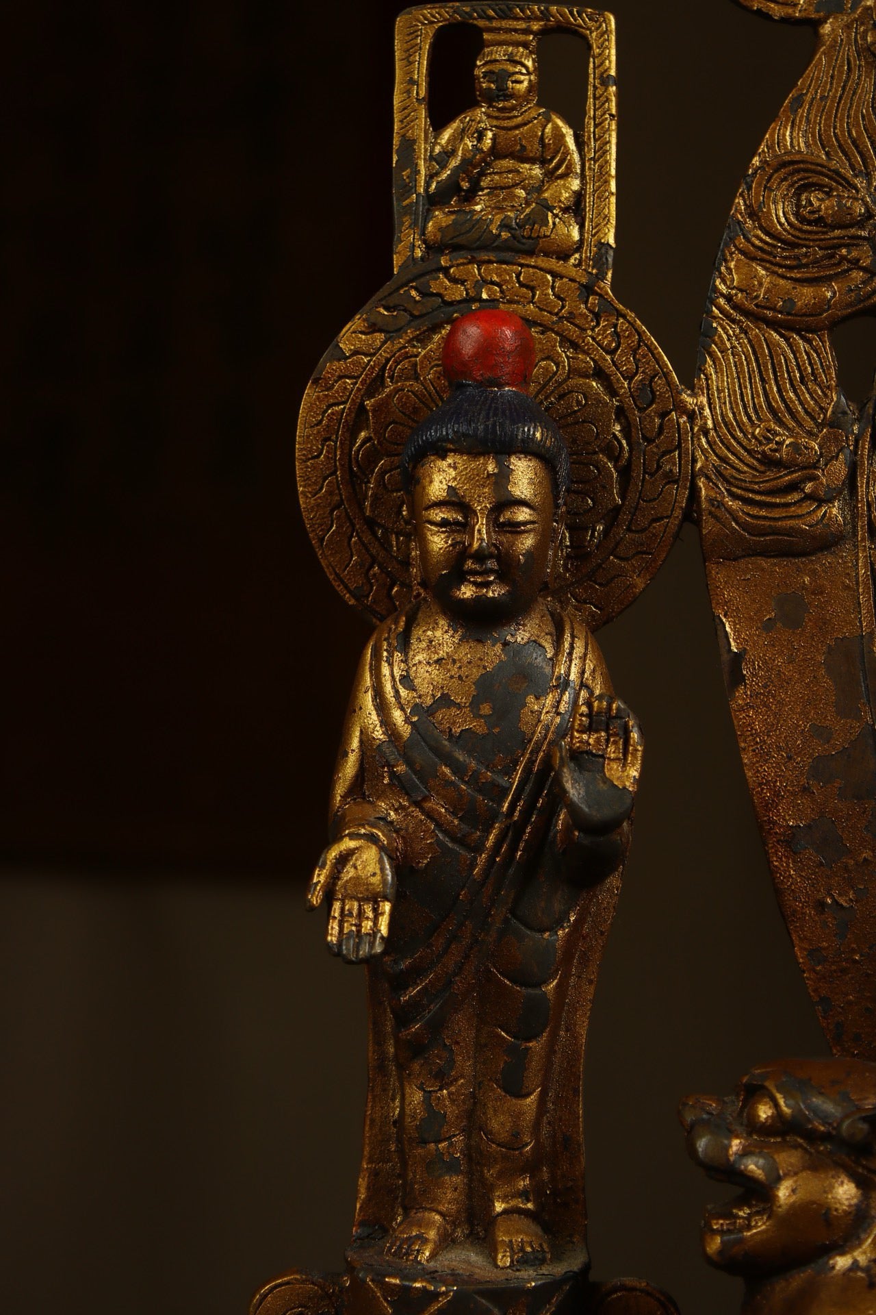 Crafted by hand with copper gilding, one Buddha and two disciples