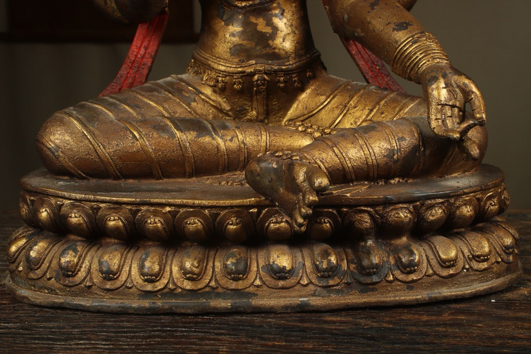 Handcrafted copper gilded Guanyin statue with four arms